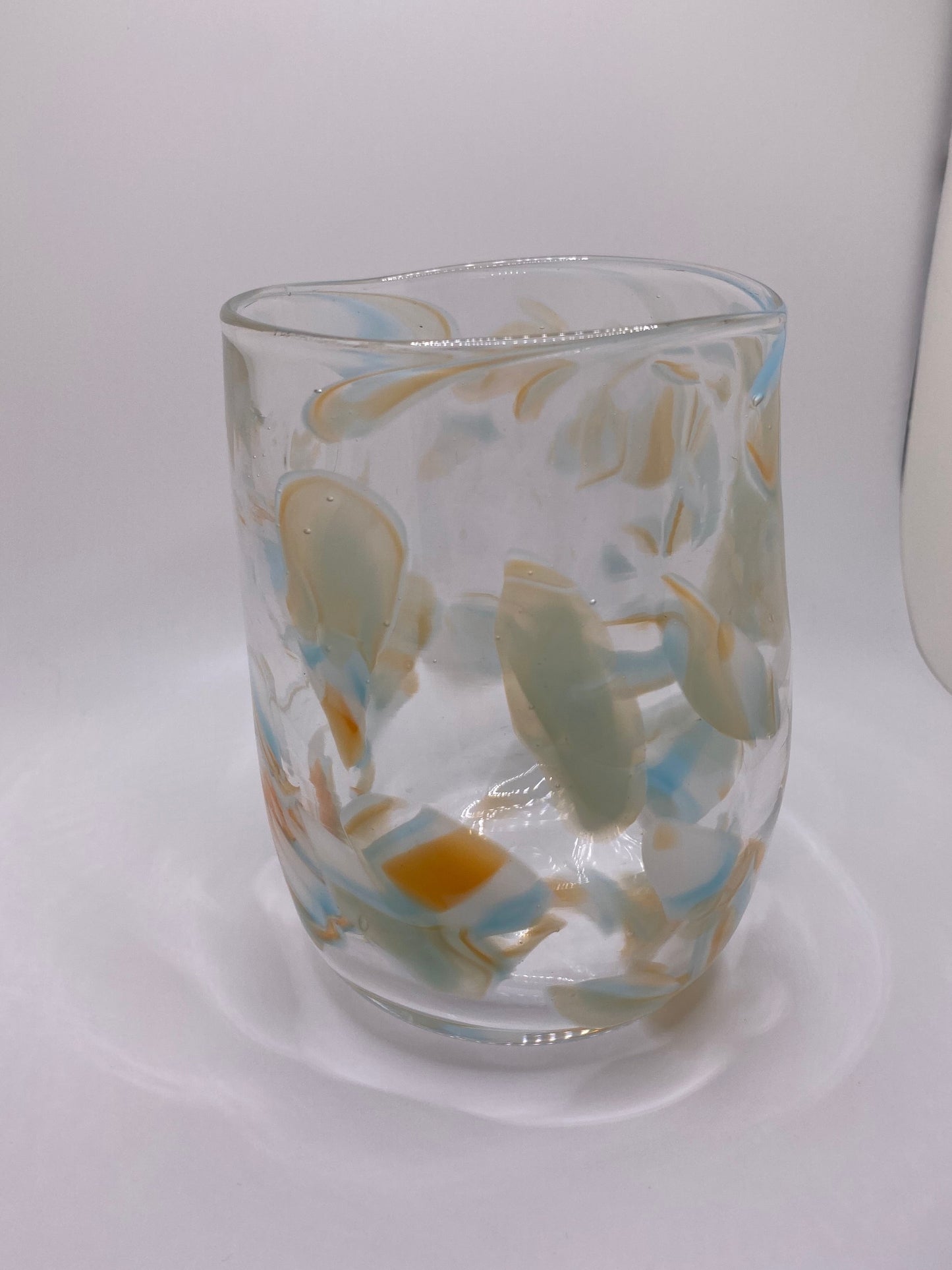 Orange and cream vase