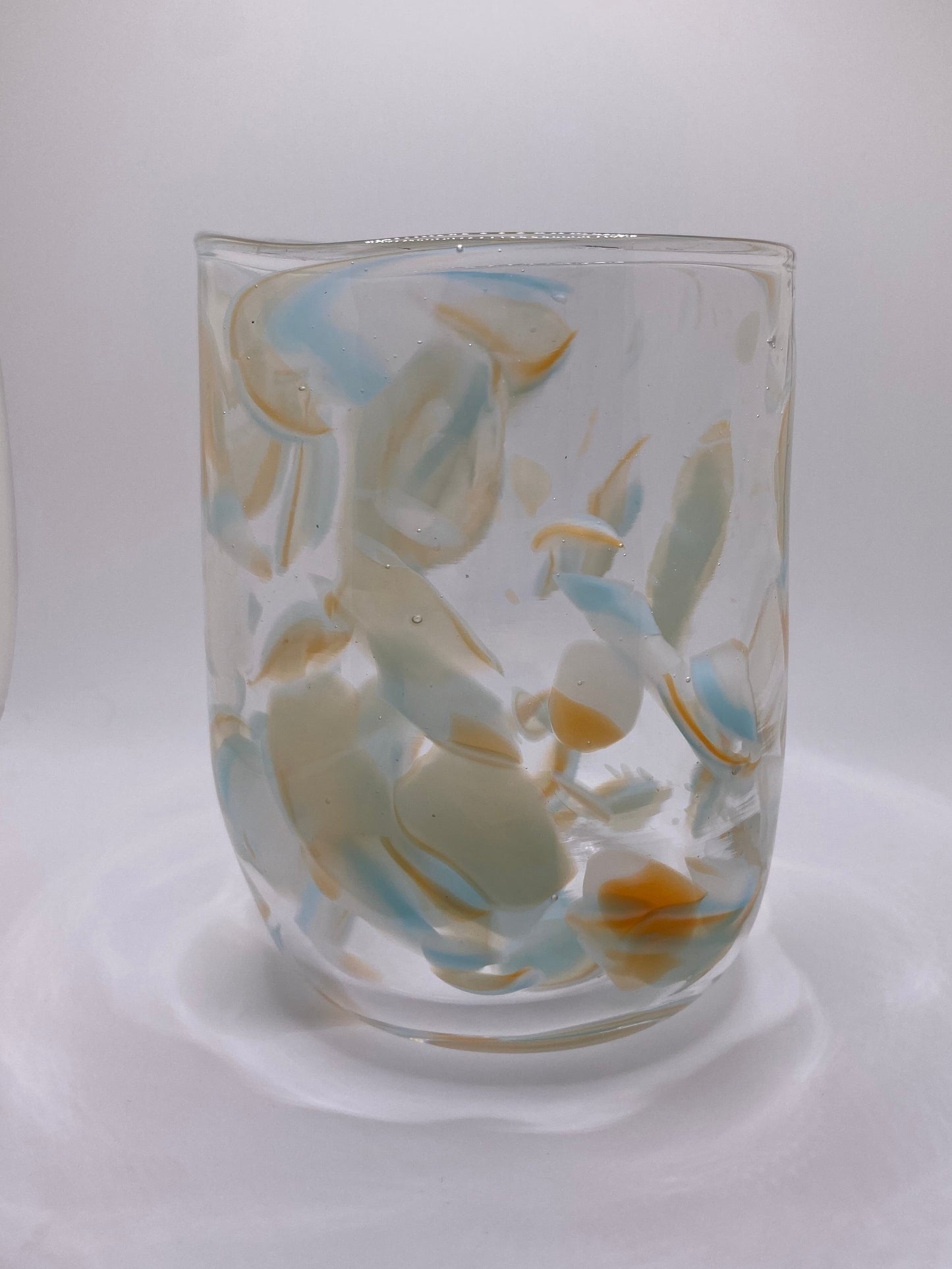 Orange and cream vase